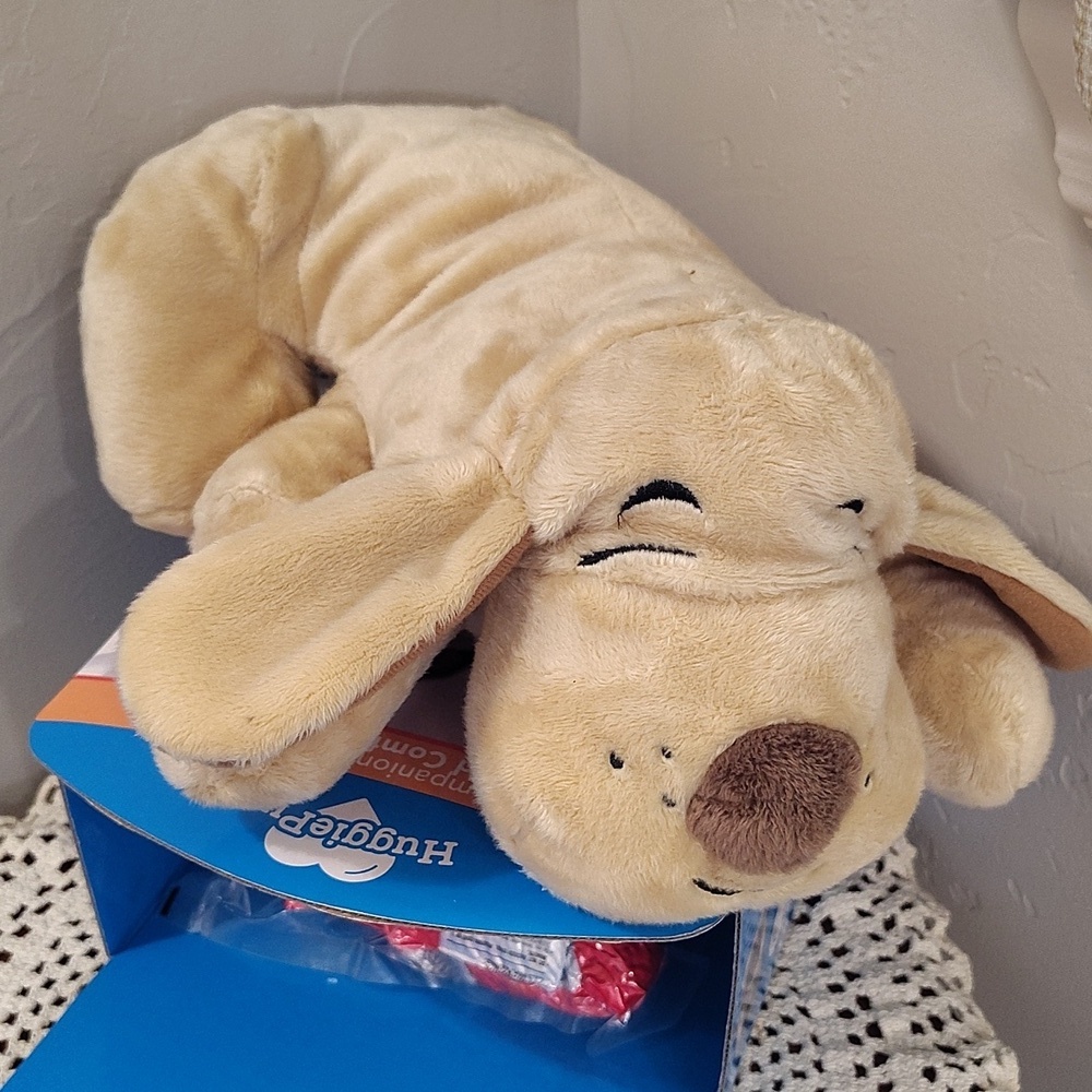 The HuggiePup is a cuddly behavioral aid toy Heartbeat Heatpack